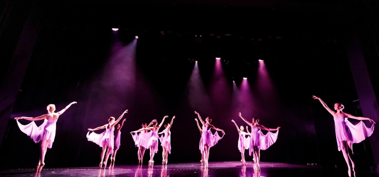 Dancers stand on pointe while performing "Facade," choreographed by faculty member Michelle Walter.