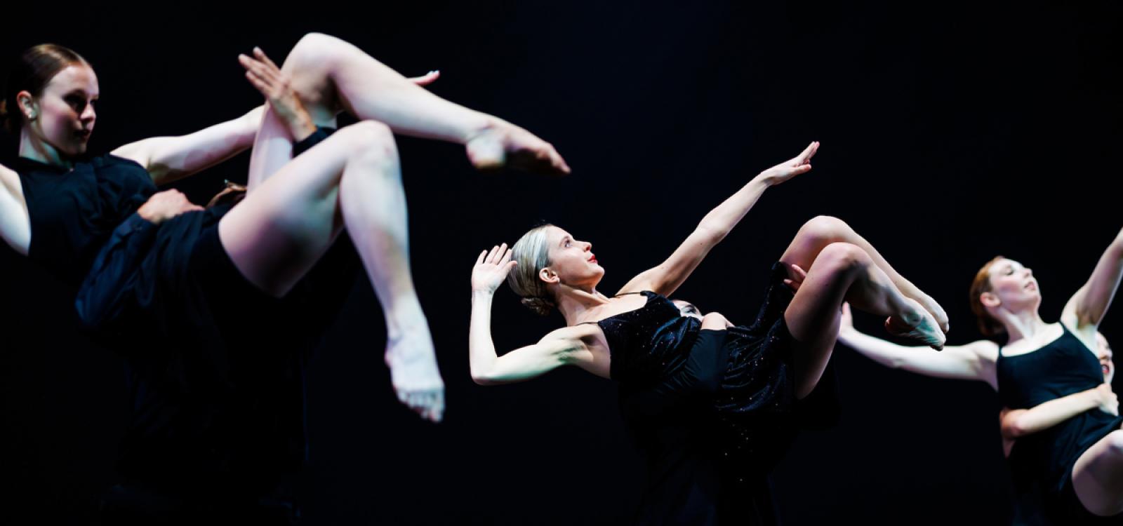 Dancers satirize competition in "Rock, Paper, Scissors," choreographed by Professor Diana Stanton.