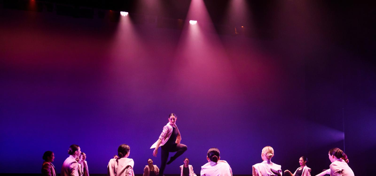 A soloist spins at center stage during "Rose Rogue," choreographed by faculty member Irene Kleinbauer.