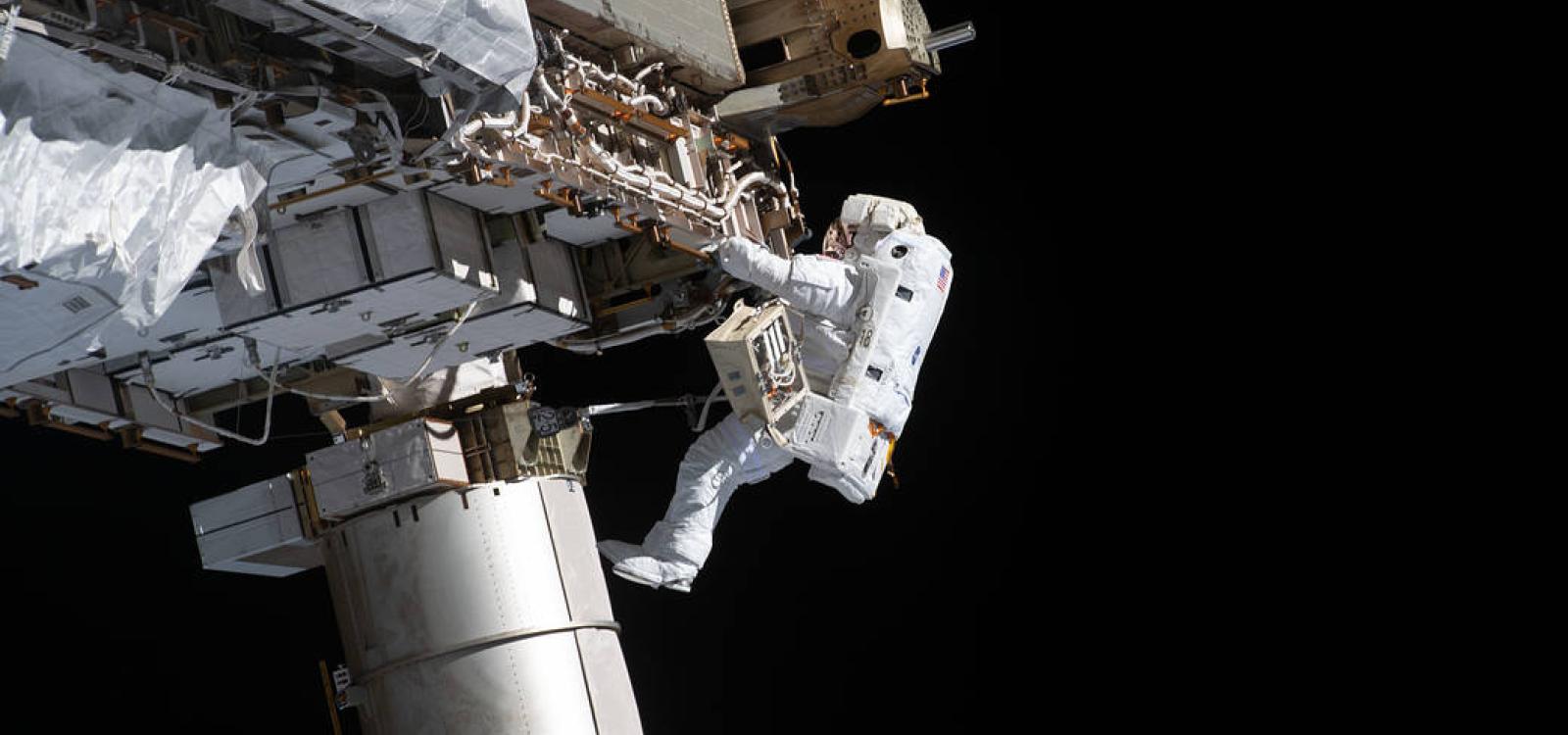 NASA spacewalker and Expedition 64 Flight Engineer Victor Glover works to ready the International Space station's port-side truss structure for future solar array upgrades in 2021.