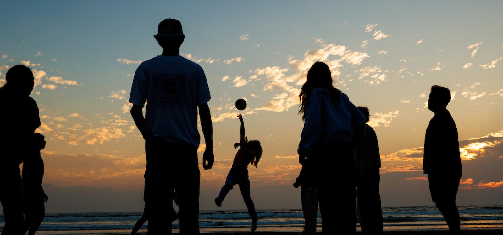 Beach bonfires are a staple of WOW events. Here, some students play ball during their bonfire at Pismo State Beach.