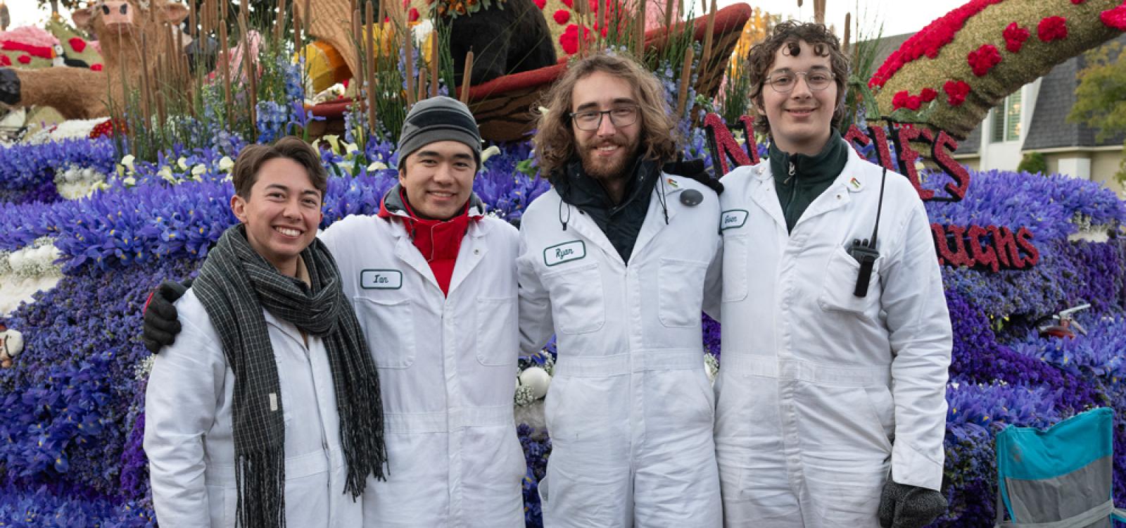 The students operating the float celebrate after judging on New Year's Eve.