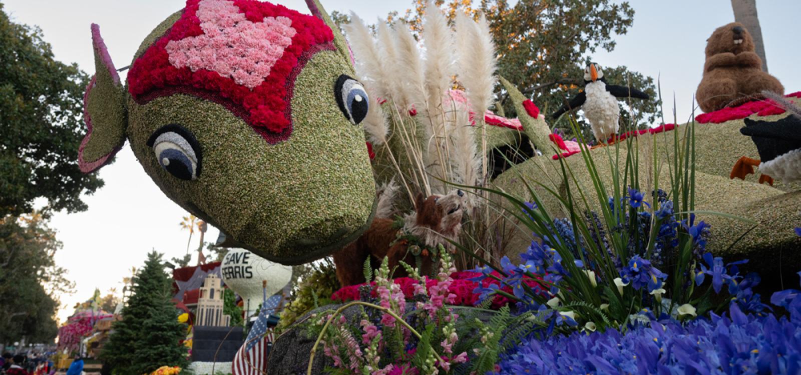 Nessie's body was decorated with green lentils and split-green peas, along with carnations and wild roses.