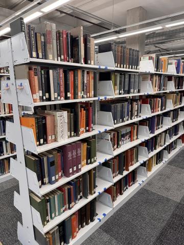 Shelves filled with books in the Kennedy Library.