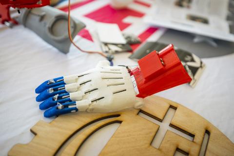 Prosthetic, mechanical hand made of plastic parts