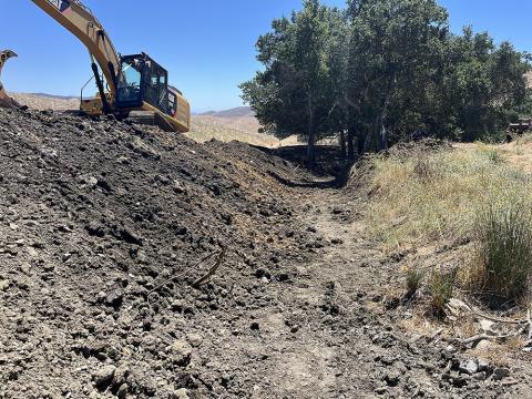 Construction equipment working on the Stenner Creek Watershed Enhancement Project. 
