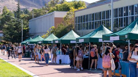 Students attending a past Study Abroad Fair on Dexter Lawn.