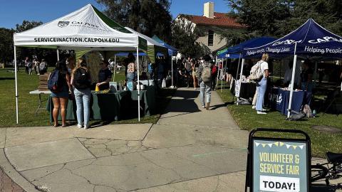 Students attending a past Volunteer and Service Fair on Dexter Lawn.