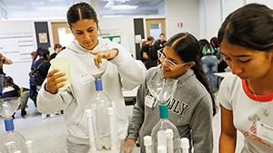 High school students participating in a United by Excellence Latine Heritage Celebración workshop.