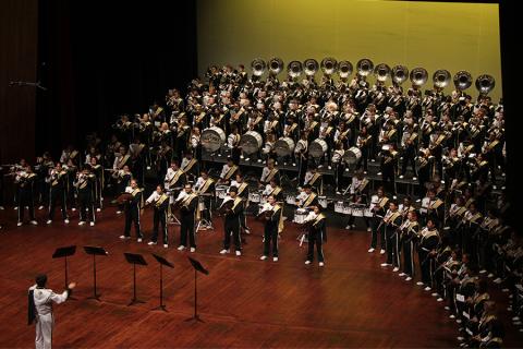 The Cal Poly Marching Band performing onstage.