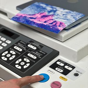 Front panel of a Risograph on top of a printer.