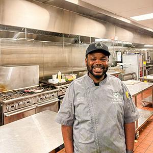 Chef Arthur Dulin standing in one of Cal Poly’s kitchens.