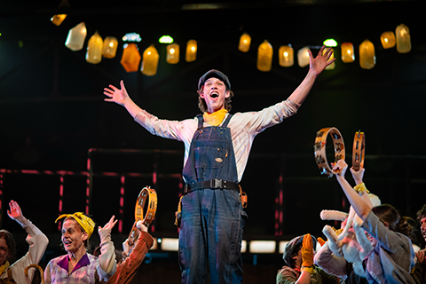 Students performing in "Urinetown: The Musical."