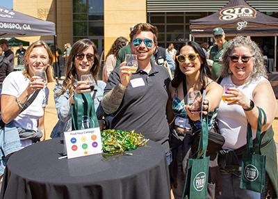 Cal Poly alumni enjoying beverages at the Wine and Beer Garden.