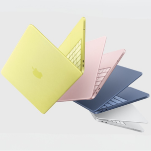 A collection of colorful Apple laptops.