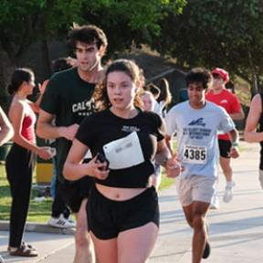 Students running in the Mustang Mile.