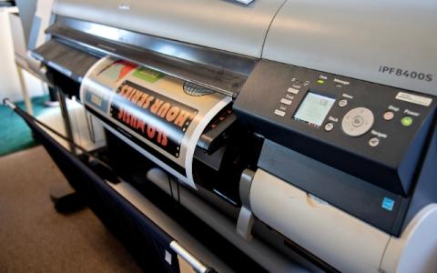 A high-resolution color image being printed.