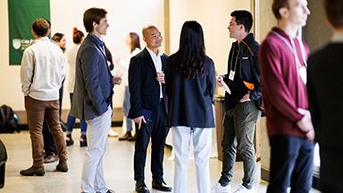 Faculty, staff and students attending a past symposium at Cal Poly.