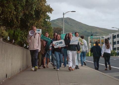 Students walking down Grand Avenue during a past Take Back the Night.