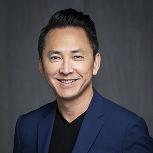 A headshot of author Viet Thanh Nguyen.