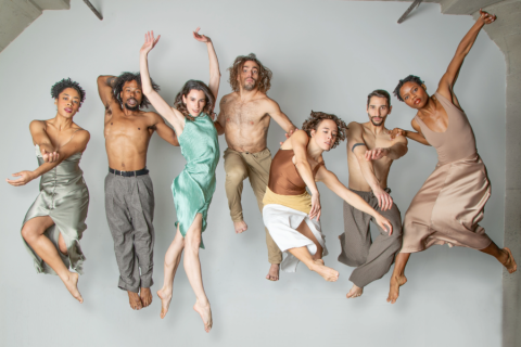 Company members of BODYTRAFFIC posing together.