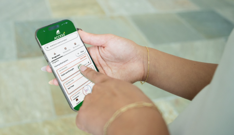 A close-up image of a person using the new ASI app on their mobile phone.