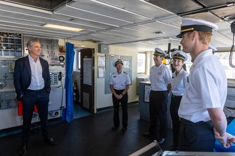 Gov. Gavin Newsom and Capt. Samar Bannister speak with Cal Poly Maritime Academy cadets aboard the Training Ship Golden Bear.