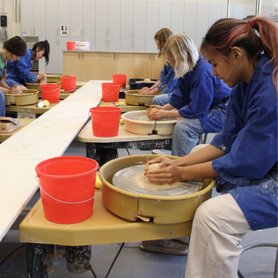 People making pottery in the SLO Campus ASI Craft Center.