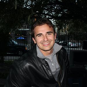 A headshot of Torrey Gage-Tomlinson.