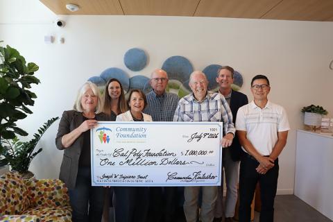 Leadership from Cal Poly and the Jospeh W. Tripiano Charitable Fund stand together with a large check for $1 million.
