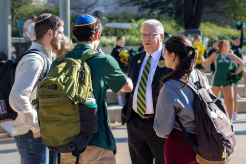 President Jeffrey Armstrong speaking to students in UU Plaza during the Cal Poly Centennial Celebration.