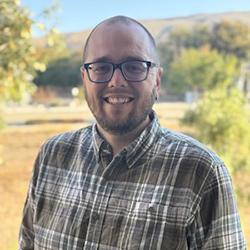 A headshot of M. Taylor Haynes, Ph.D.