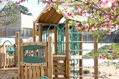 Playground equipment in front of the Preschool Learning Lab.