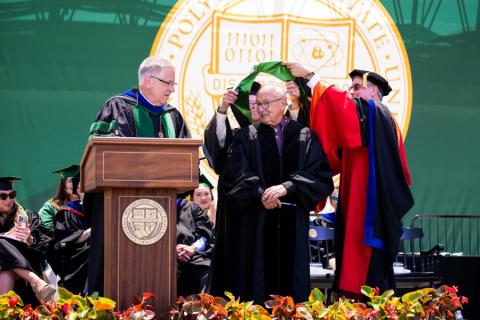 William Frost accepting an honorary degree at commencement.