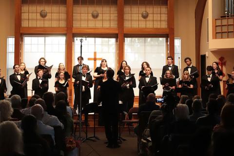 The Cal Poly choirs performing in front of an audience.