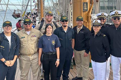 Cal Poly Maritime Academy students and faculty aboard the tall ship with its crew.