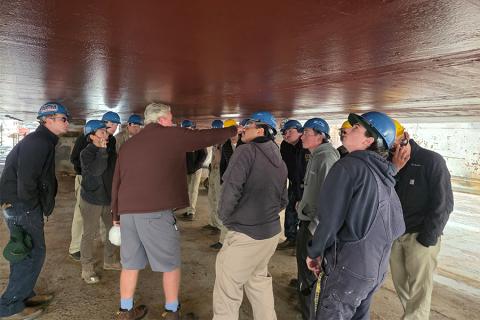 Cal Poly Maritime Academy students inspecting R/V Sally Ride.