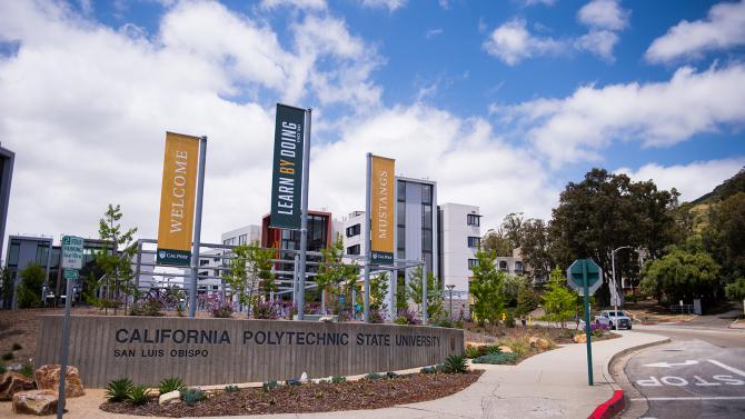 Grand avenue entrance to campus including a sign stating California Polytechnic State University
