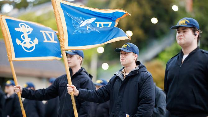 Cadets at attention with banners