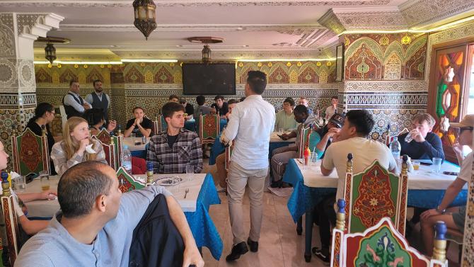Students attending a class in a Middle Eastern classroom.