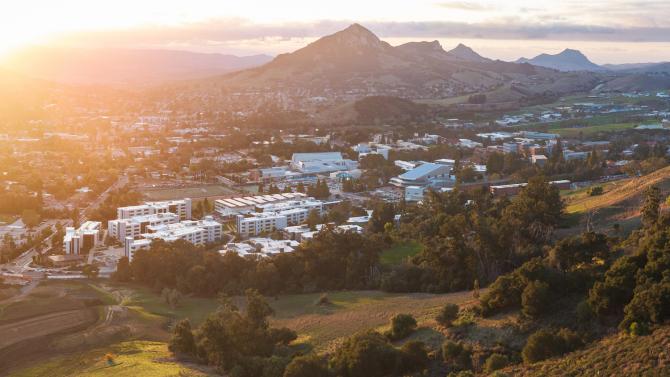 An aerial photo of the Cal Poly campus at sunset